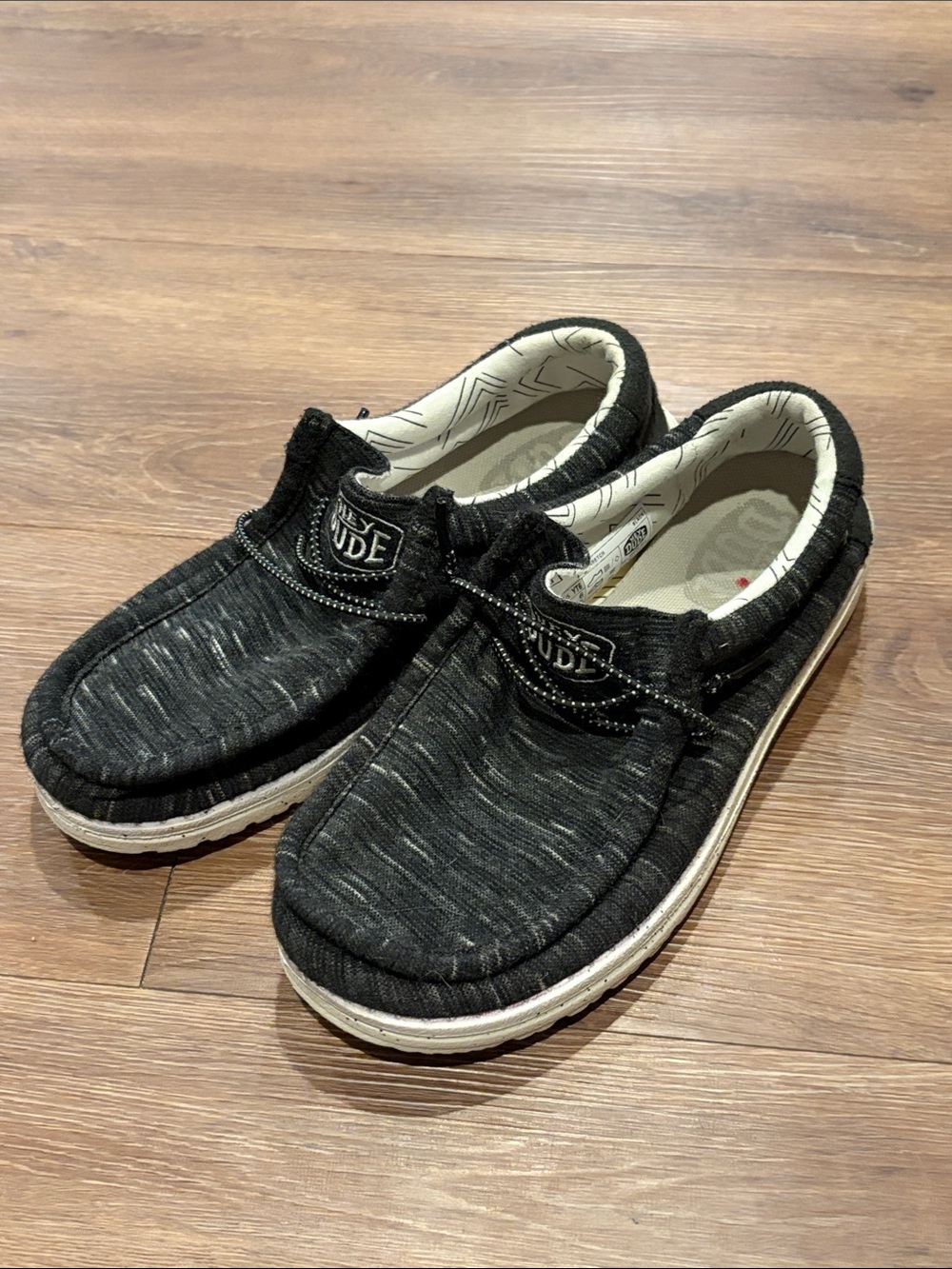 Hey Dude Black & White Canvas Slip-Ons size 6Y or women’s 8
